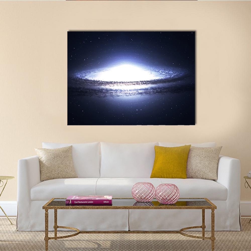 Spiral Galaxy in Deep Space Canvas Wall Art in black, white and blue, single panel hung on a wall