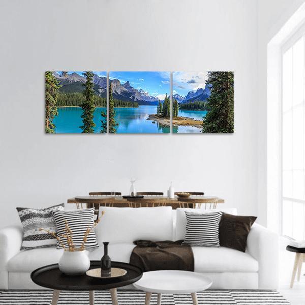 Spirit Island on Maligne Lake Panoramic Canvas Wall Art in gray, green and blue, hung on a wall