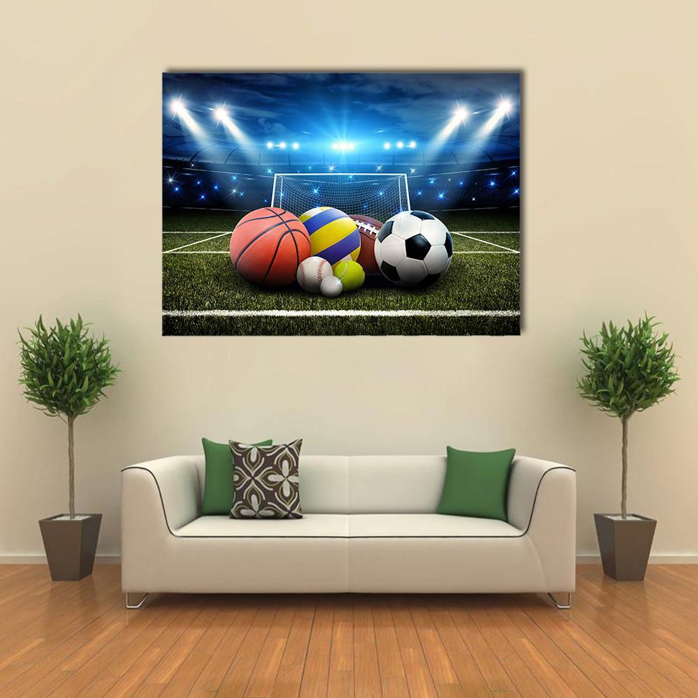 Cluster of Sports Balls Under Stadium Lights Canvas Wall Art in black, green and blue, single panel hung on a wall
