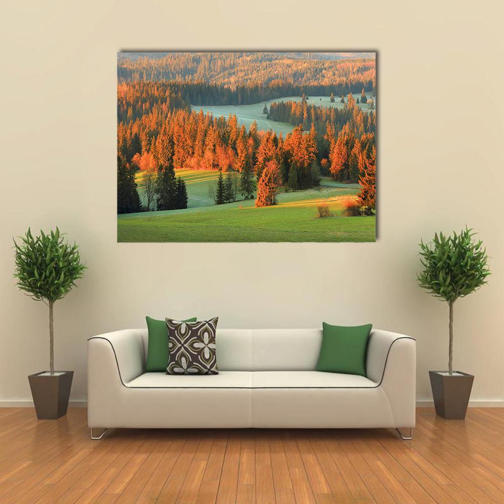 Green Valley at Golden Hour Canvas Wall Art in gold, orange and green, single panel hung on a wall