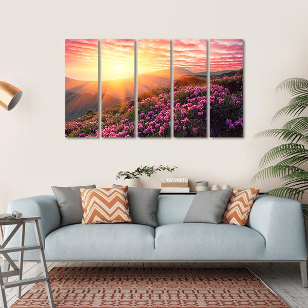 Spring Sunrise Over Mountain Rhododendrons Canvas Wall Art in orange, yellow and pink, hung on a wall