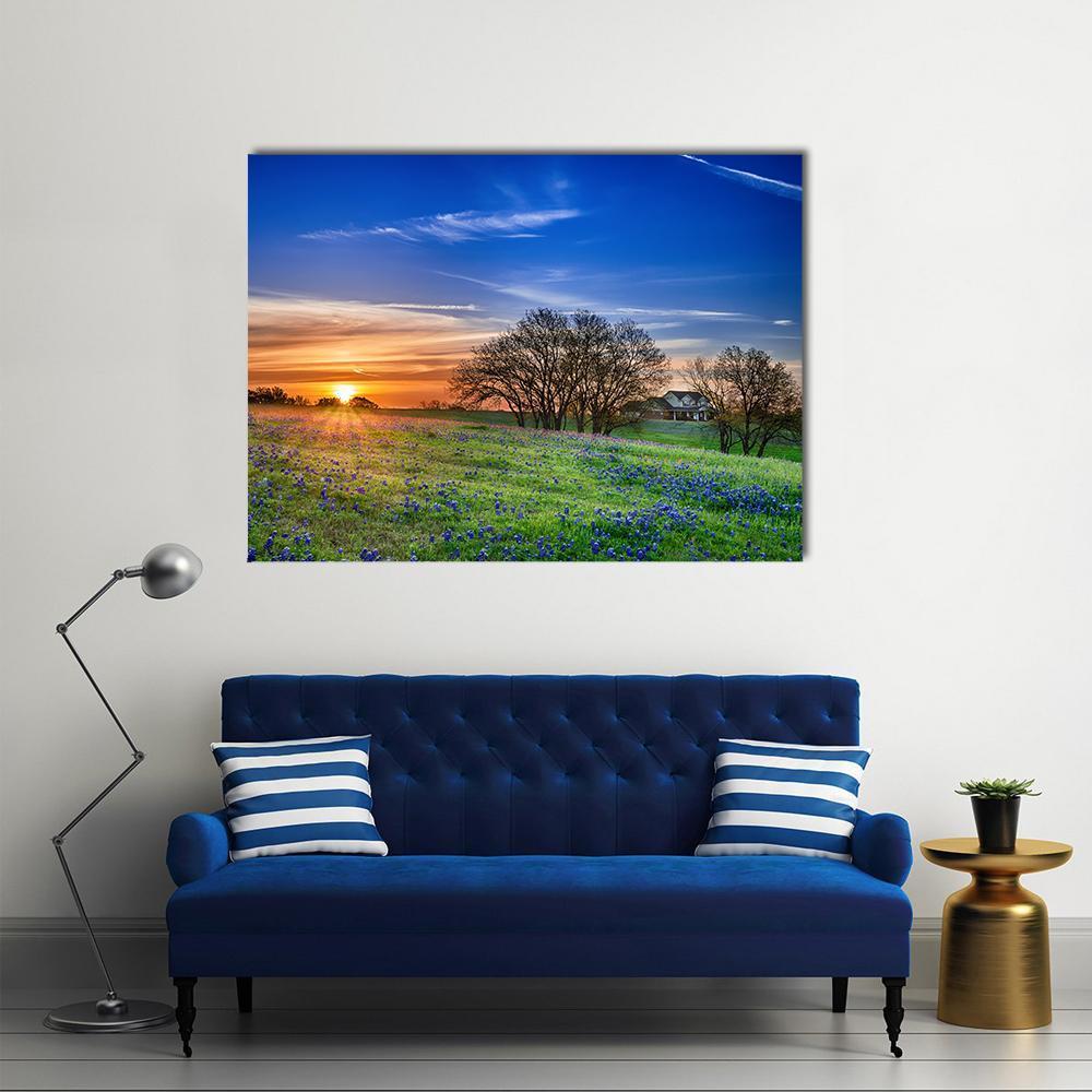Texas Bluebonnet Field at Sunset Canvas Wall Art in orange, green and blue, single panel hung on a wall