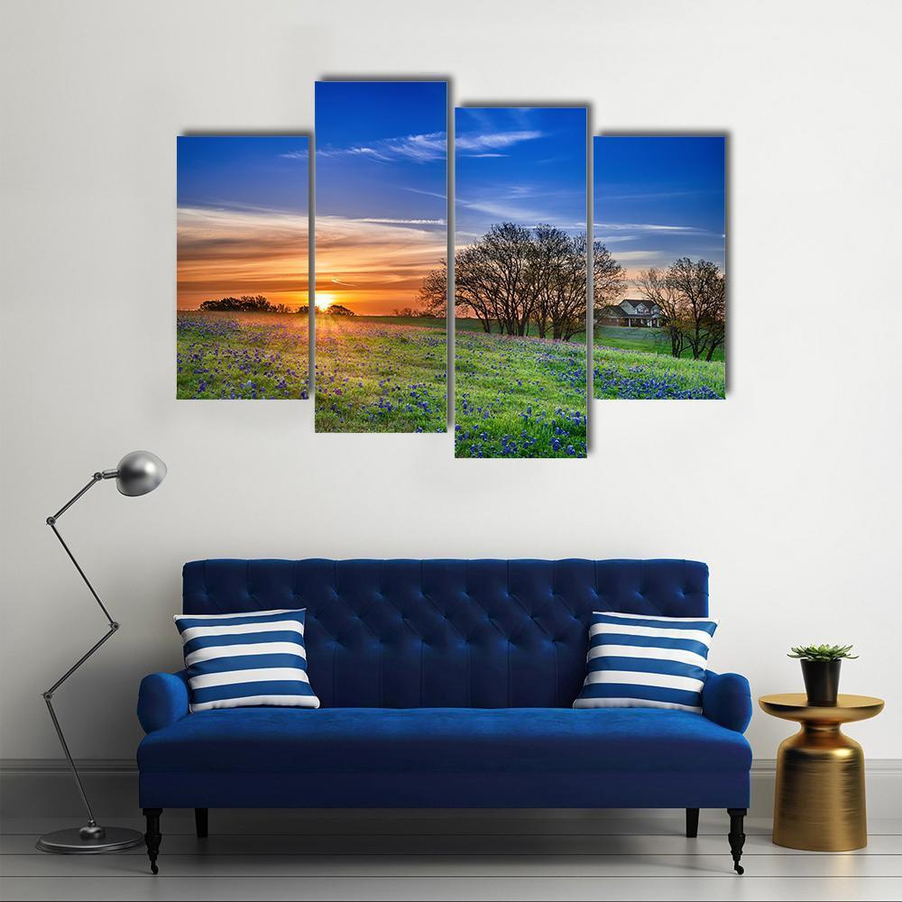 Texas Bluebonnet Field at Sunset Canvas Wall Art in orange, green and blue, 3 panel horizontal set hung on a wall