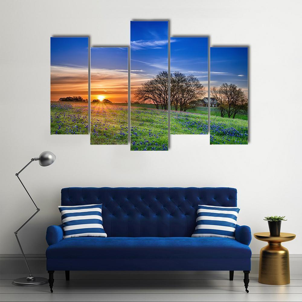 Texas Bluebonnet Field at Sunset Canvas Wall Art in orange, green and blue, 5 panel Pop layout hung on a wall