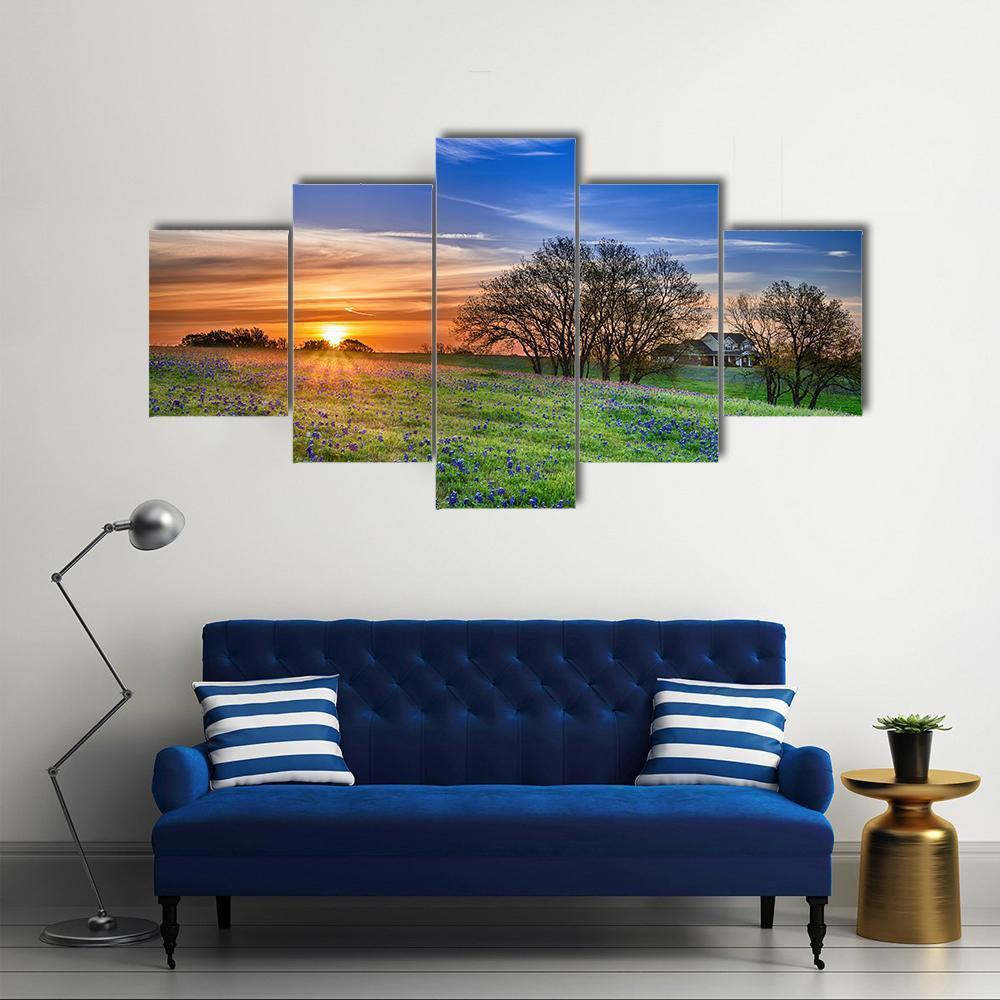 Texas Bluebonnet Field at Sunset Canvas Wall Art in orange, green and blue, 5 panel Star layout hung on a wall
