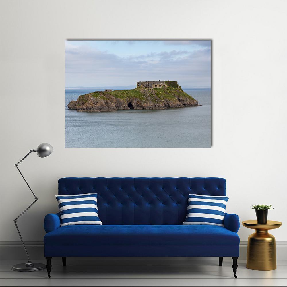 Island with Castle Ruins and Cloudy Sky Canvas Wall Art in gray, green and blue, single panel hung on a wall