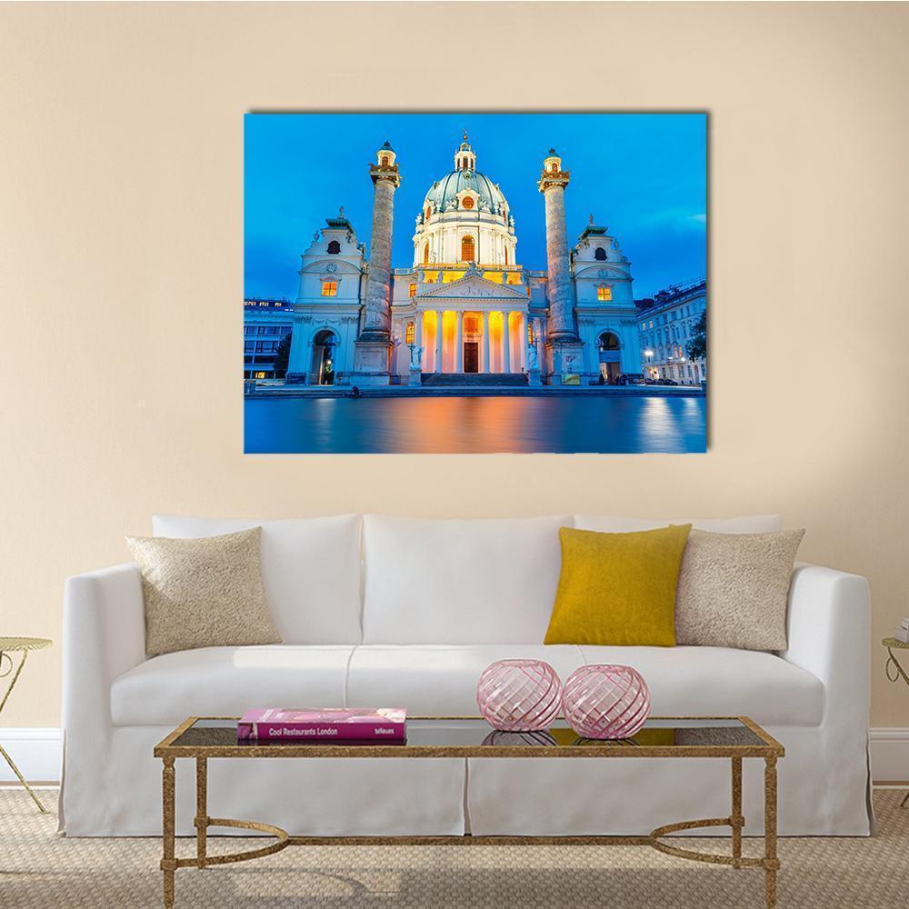 St Charles Church at Twilight Canvas Wall Art in white, yellow and blue, single panel hung on a wall