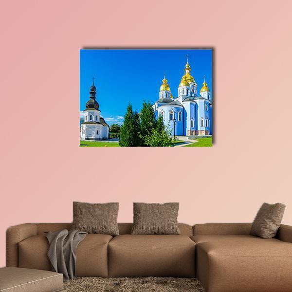 St John and St Michael's Cathedral Canvas Wall Art in white, gold and blue, single panel hung on a wall