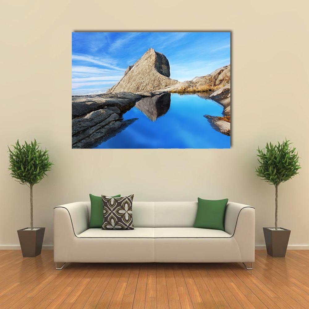 St John's Peak with Lake Reflection Canvas Wall Art in gray, brown and blue, single panel hung on a wall