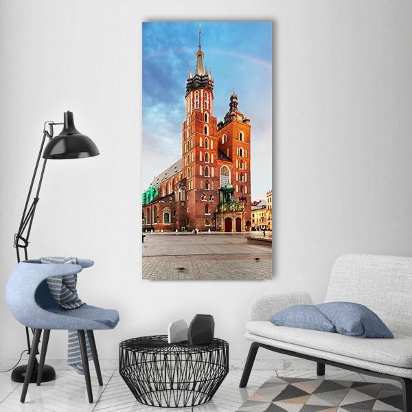 St Mary's Basilica in Krakow Vertical Canvas Wall Art in brown, orange and blue, single vertical panel hung on a wall