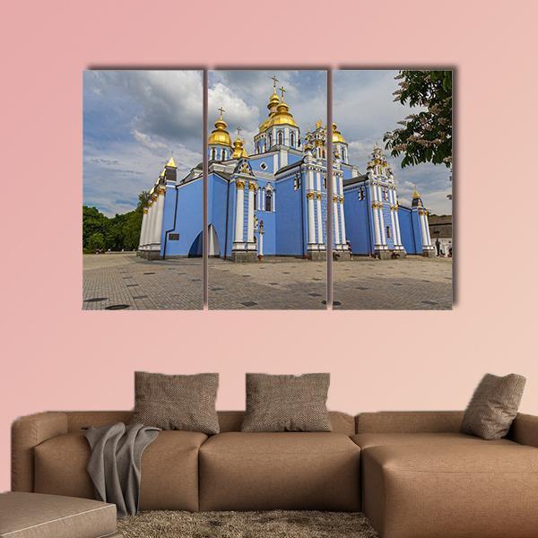 St Michael's Golden-domed Monastery, Ukraine Canvas Wall Art in gray, gold and blue, 3 panel horizontal set hung on a wall