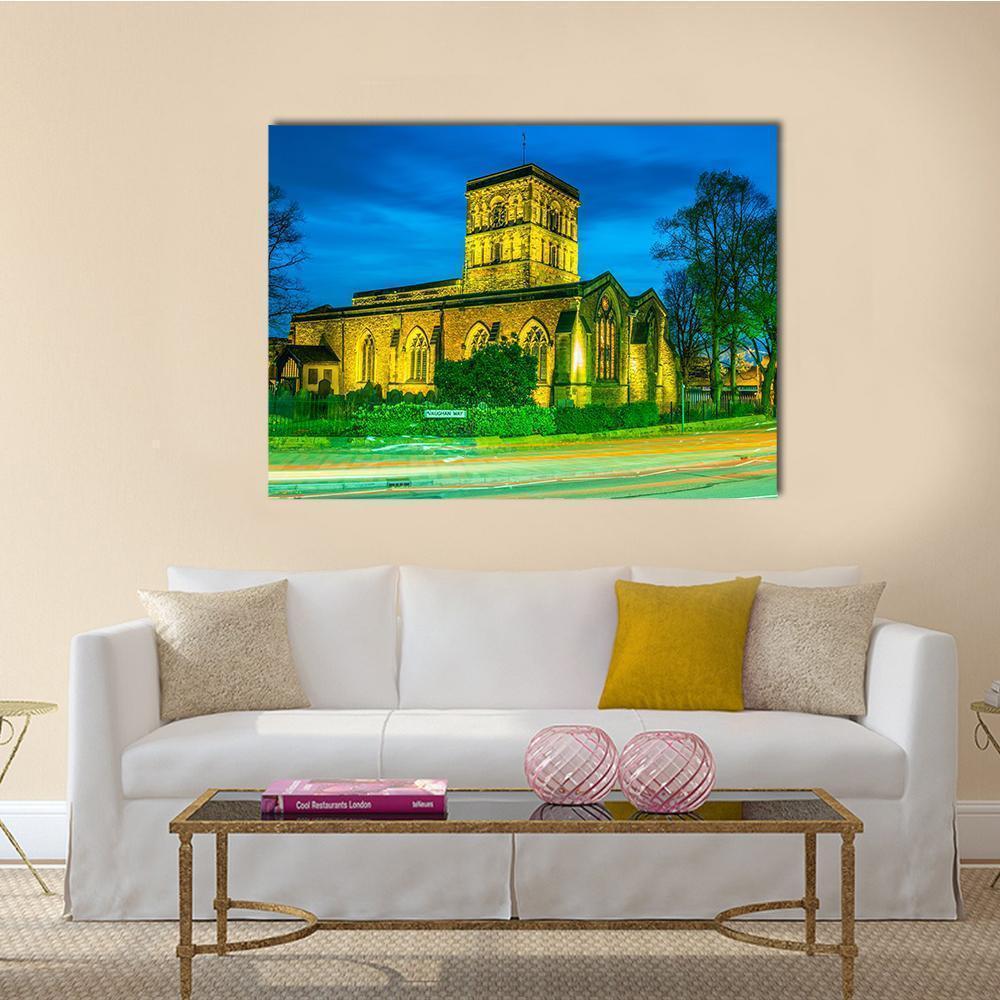 St Nicholas Church in Leicester Canvas Wall Art in yellow, green and blue, single panel hung on a wall