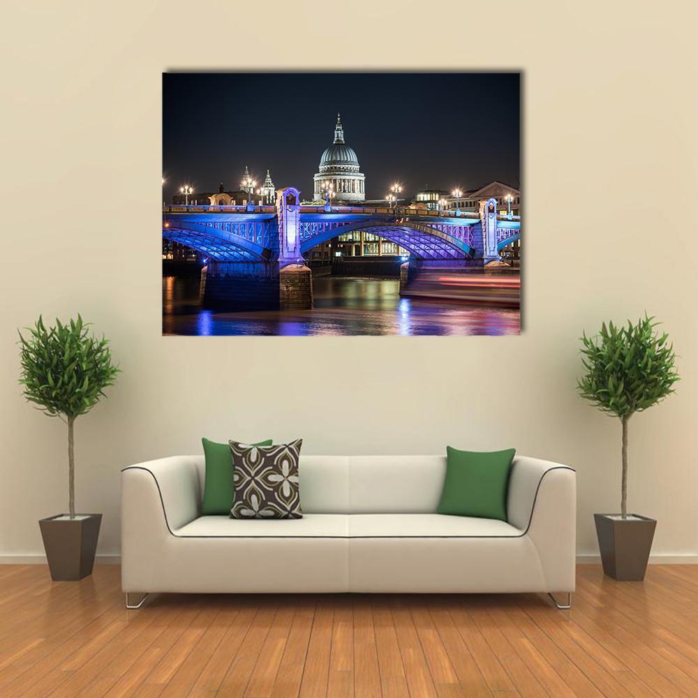 St Paul's Cathedral at Night Canvas Wall Art in black, yellow and blue, single panel hung on a wall