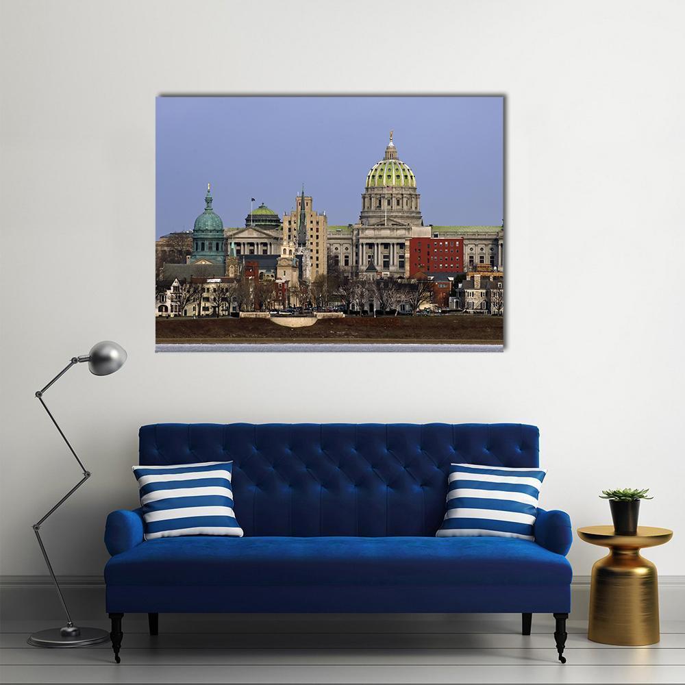 State Capitol Complex Canvas Wall Art in gray, brown and blue, single panel hung on a wall
