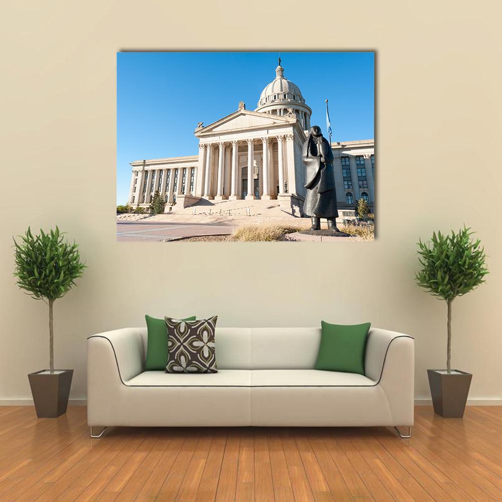 Oklahoma State Capitol Dome and Bronze Statue Canvas Wall Art in gray, beige and blue, single panel hung on a wall