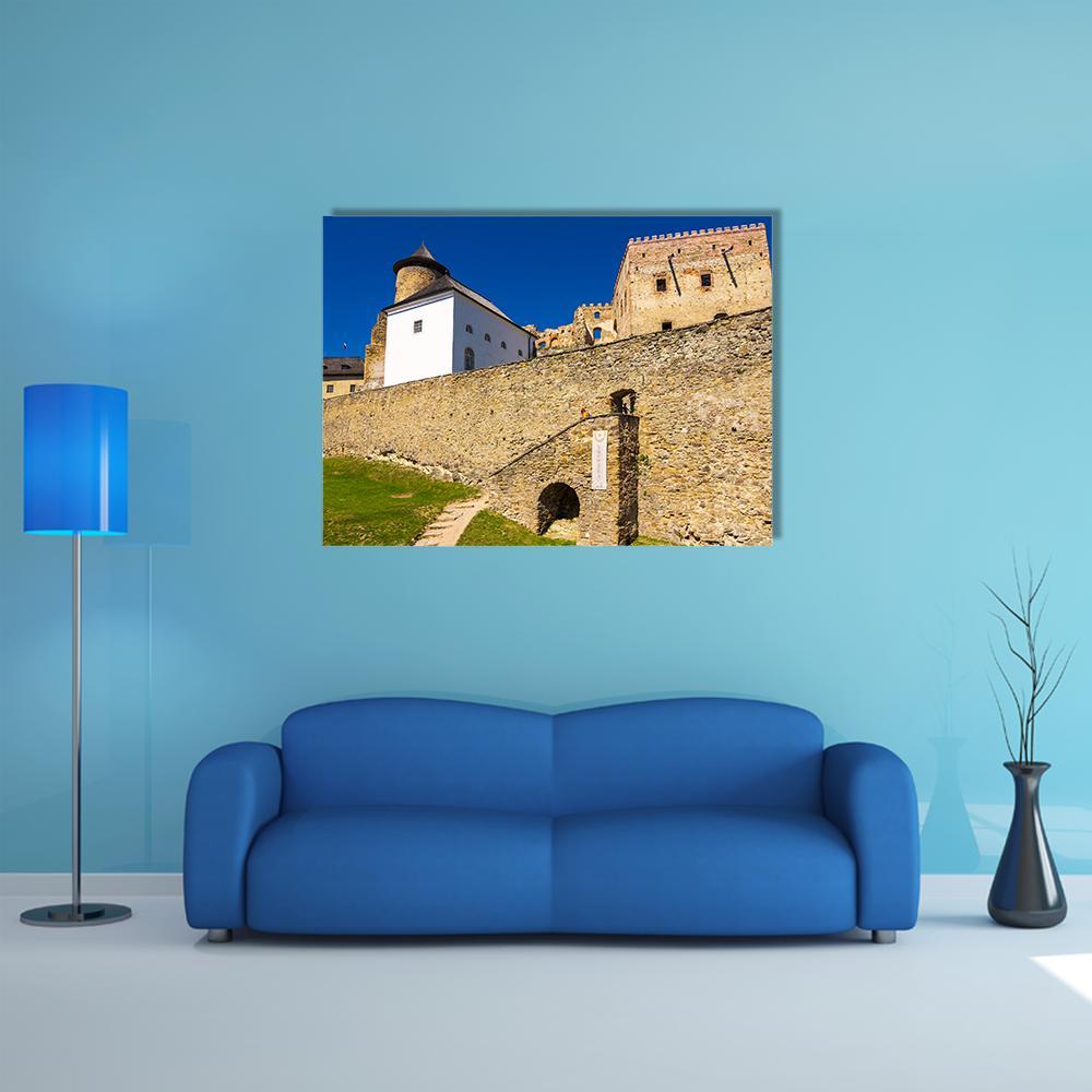 Stone Walls of Stara Lubovna Castle Canvas Wall Art in beige, brown and blue, single panel hung on a wall