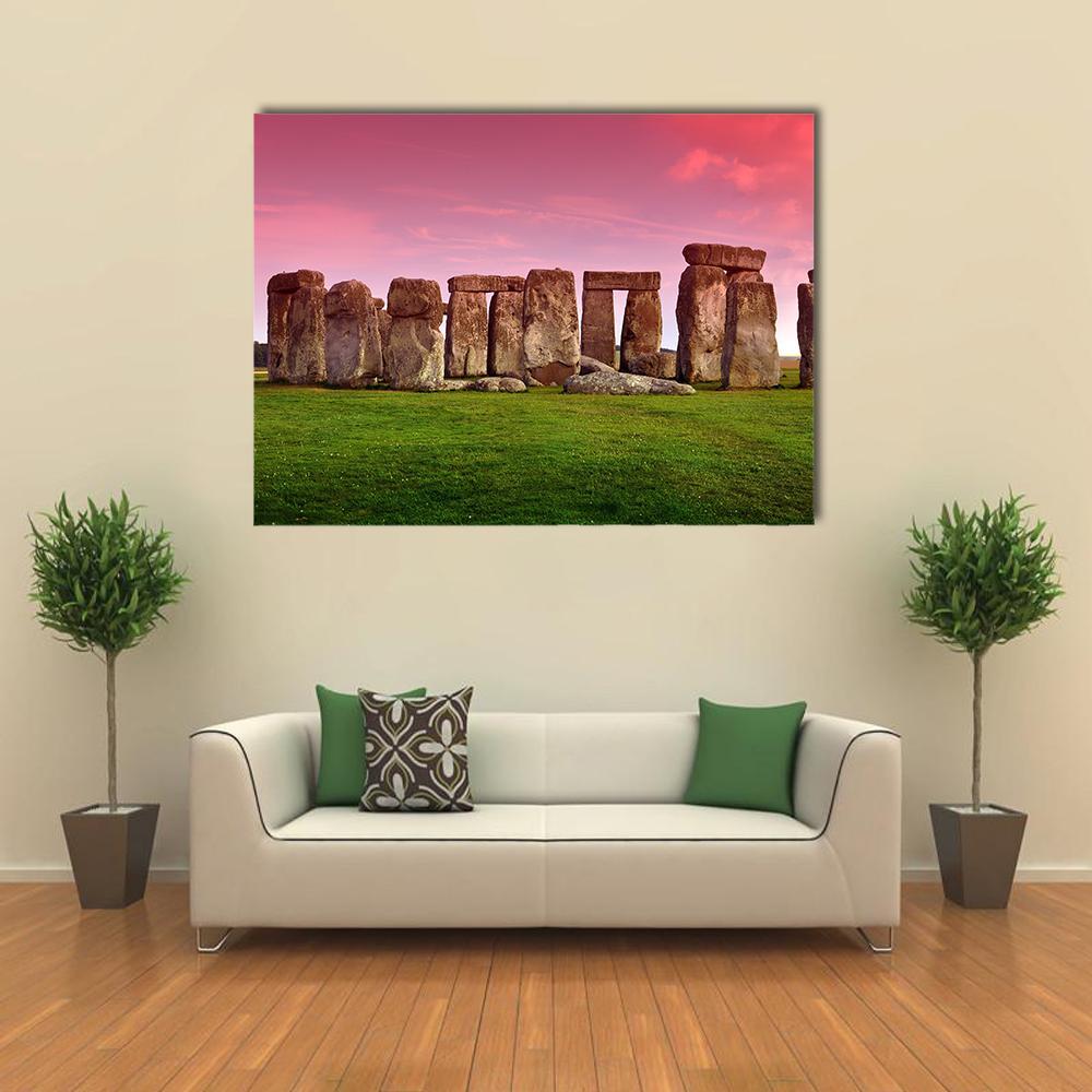 Stonehenge at Sunset Canvas Wall Art in green, purple and pink, single panel hung on a wall