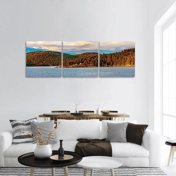 Strait of Georgia Sunset Landscape Panoramic Canvas Wall Art in brown, orange and blue, hung on a wall