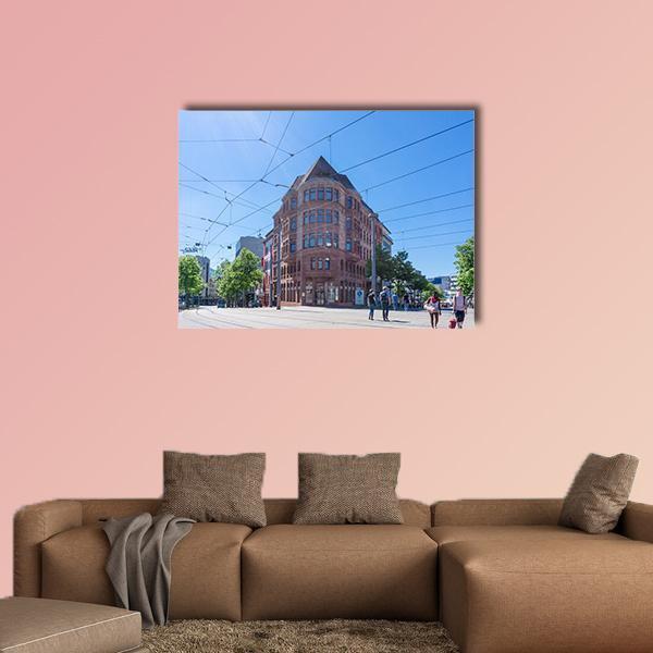 Saarbrucken Street View Canvas Wall Art in gray, brown and blue, single panel hung on a wall