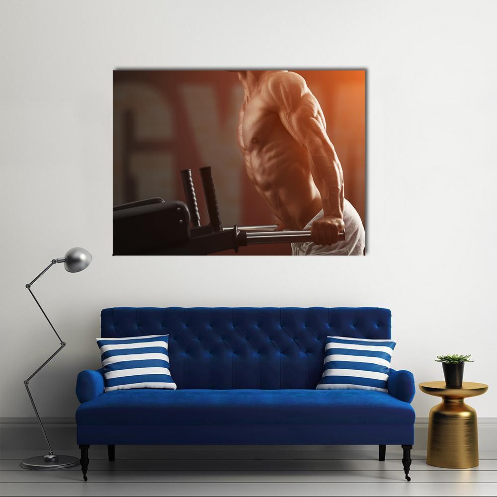 Intense Muscular Bodybuilder Close-up Canvas Wall Art in black, brown and orange, single panel hung on a wall