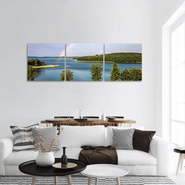 Stroust Lake in Braslav Region Panoramic Canvas Wall Art in white, green and blue, hung on a wall