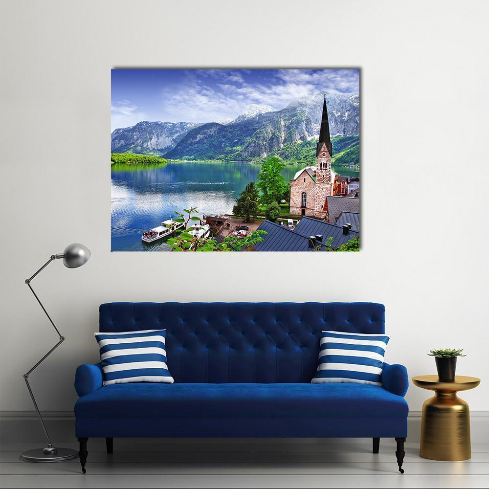 Hallstatt Alpine Lake with Church Spire Canvas Wall Art in gray, green and blue, single panel hung on a wall