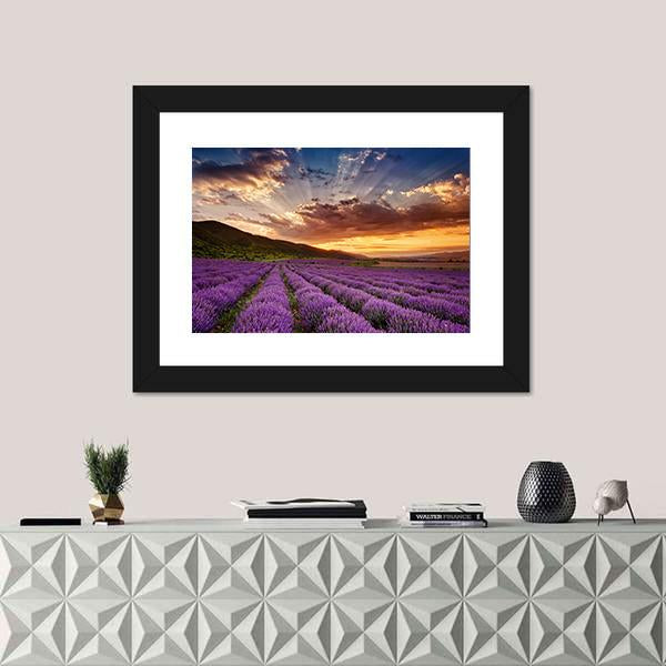 Sunset Over Lavender Field and Mountains Canvas Wall Art in orange, yellow and purple, framed print, product view on a white background