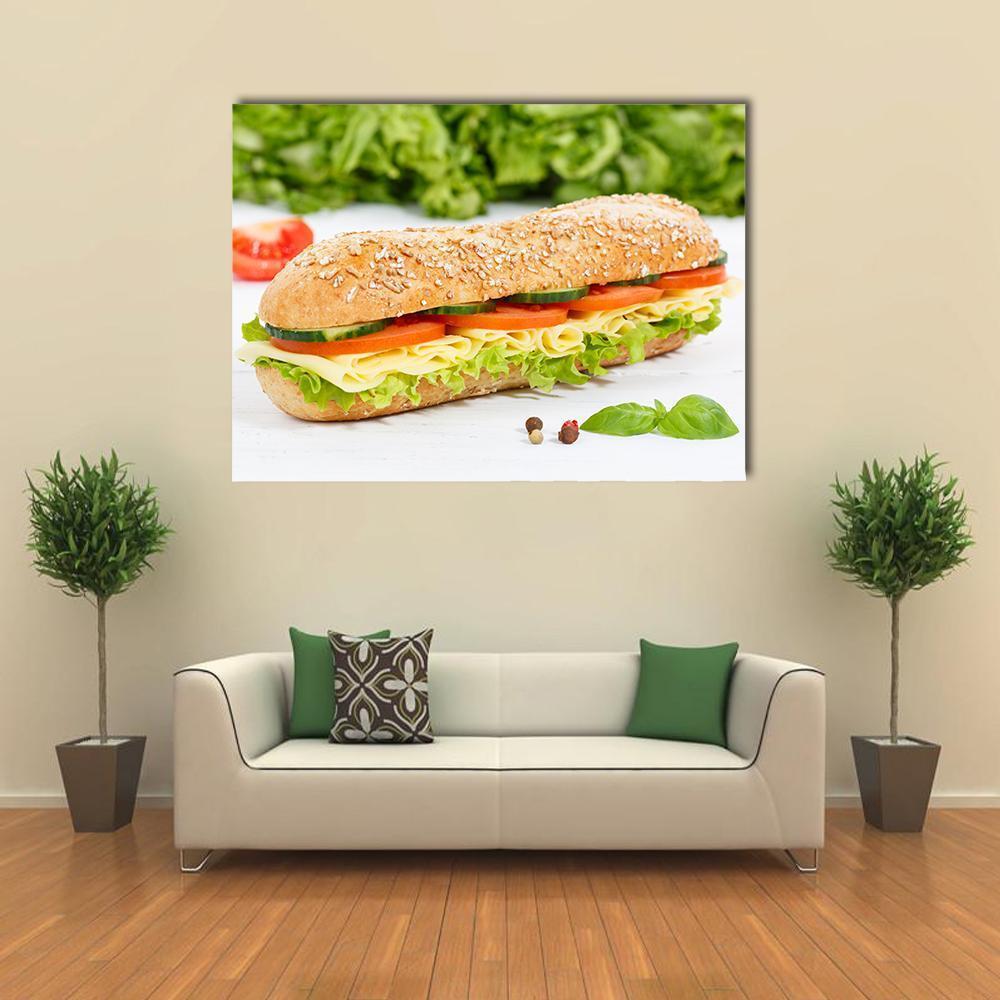 Cheese Sub Sandwich Canvas Wall Art in white, brown and green, single panel hung on a wall