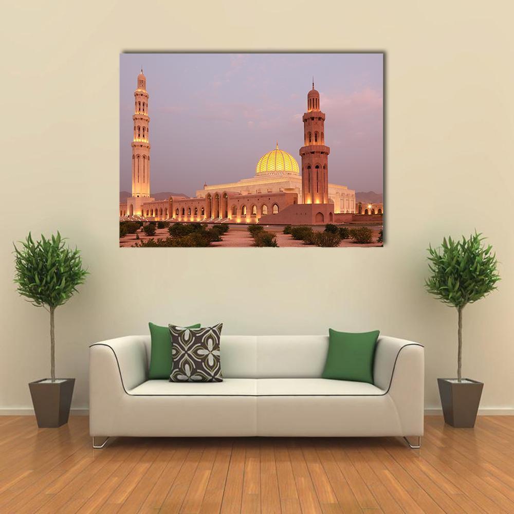 Sultan Qaboos Grand Mosque at Dusk Canvas Wall Art in beige, gold and pink, single panel hung on a wall