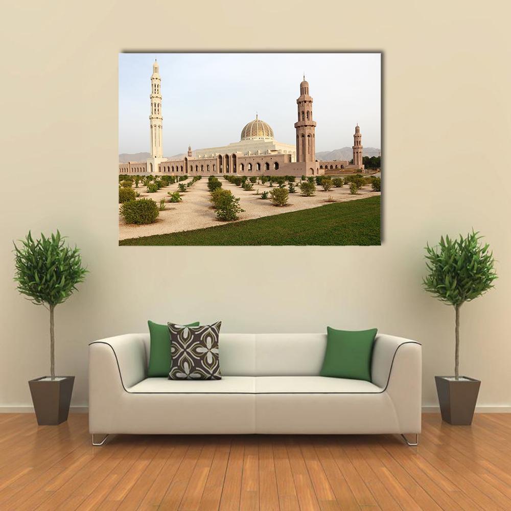 Sultan Qaboos Grand Mosque Courtyard View Canvas Wall Art in white, beige and green, single panel hung on a wall