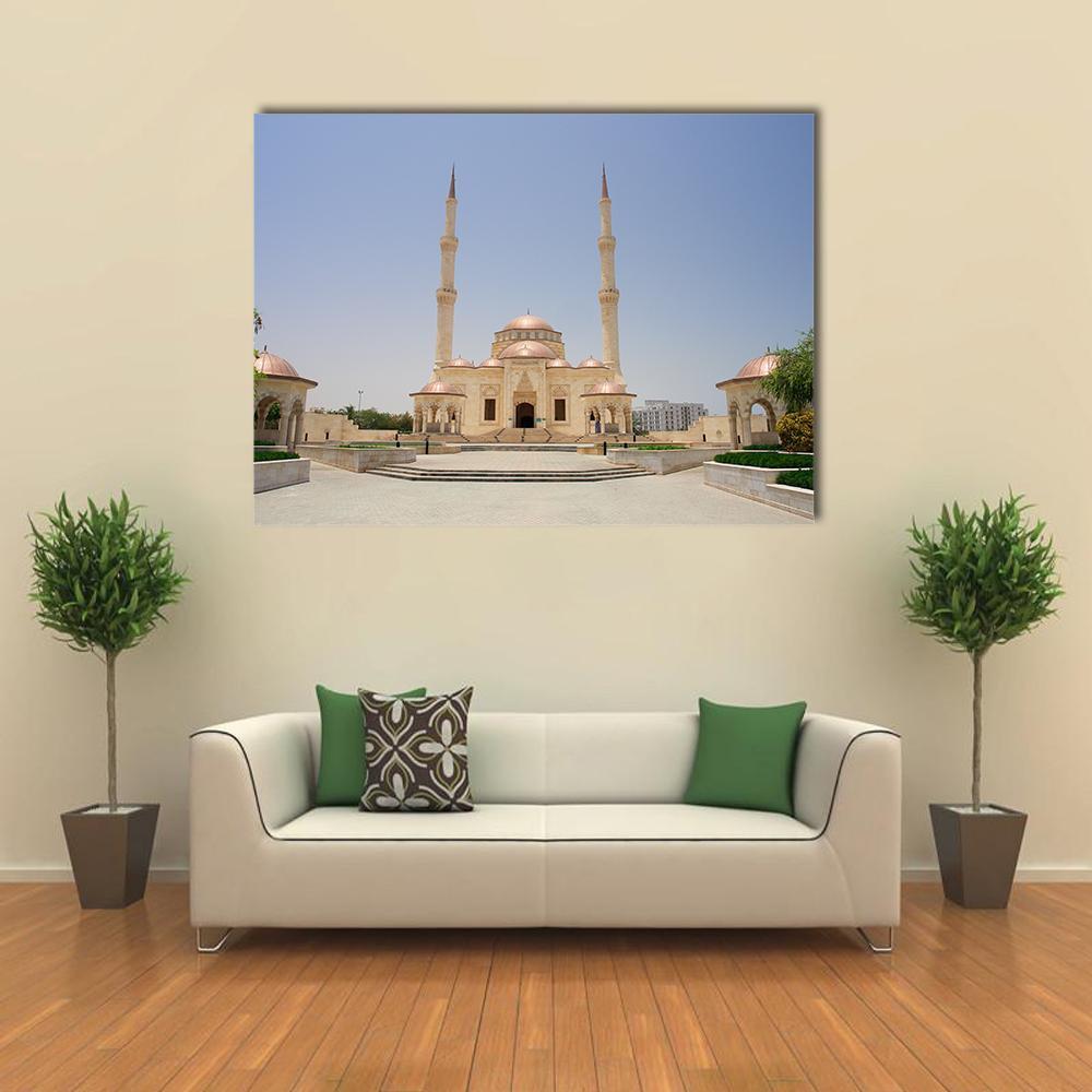 Sultan Taymoor Grand Mosque Canvas Wall Art in beige and blue, single panel hung on a wall