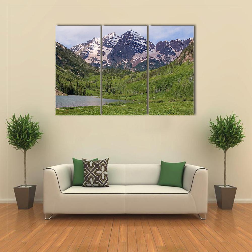 Maroon Bells Reflections in Summer Canvas Wall Art in white, green and blue, 3 panel horizontal set hung on a wall