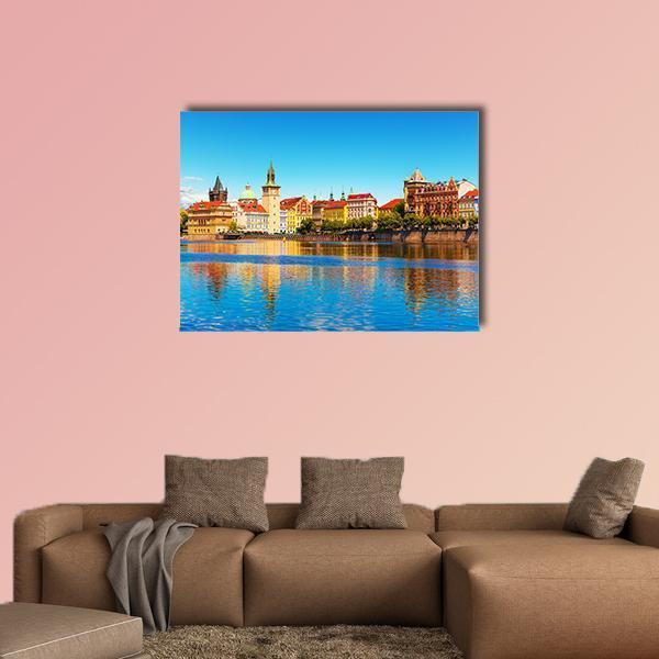 Prague Old Town Summer View Canvas Wall Art in orange, yellow and blue, single panel hung on a wall
