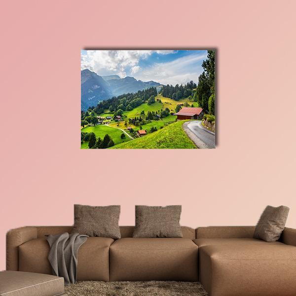 Summer View of Wengen Village Canvas Wall Art in green and blue, single panel hung on a wall