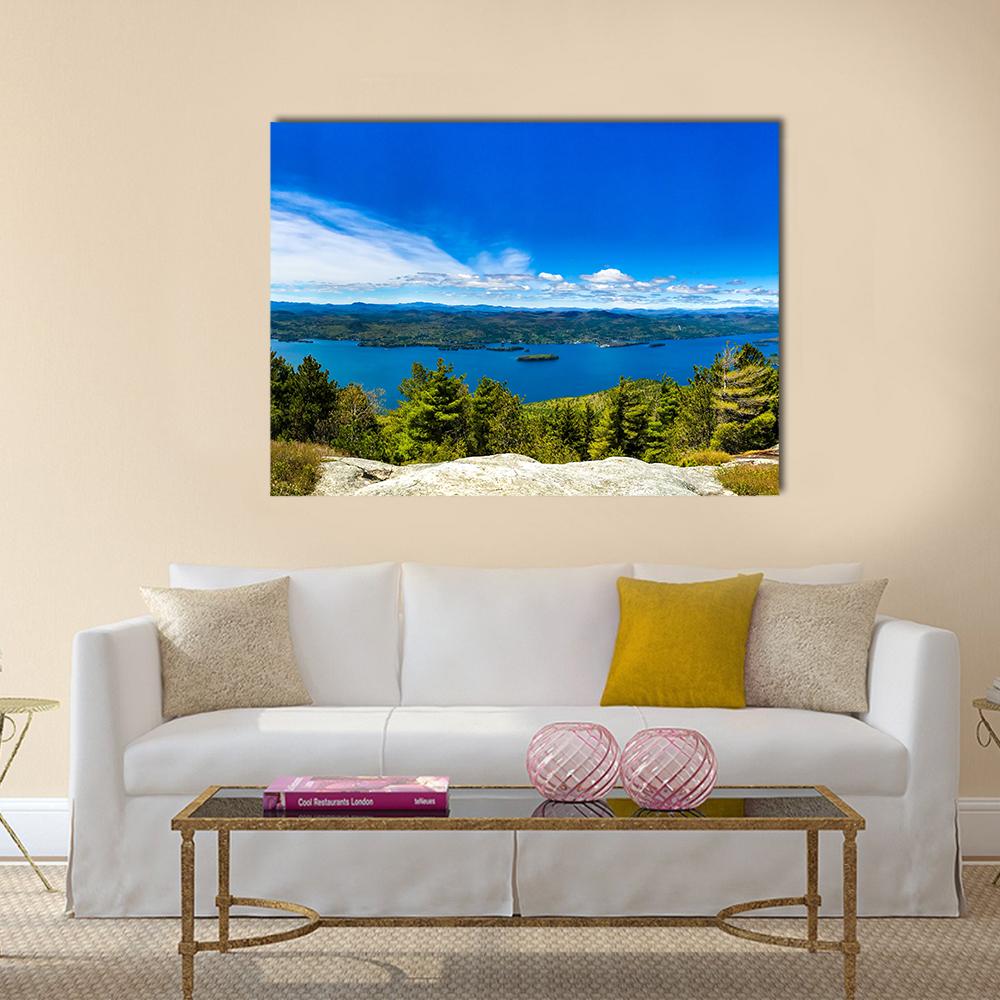 Buck Mountain Summit Over Lake Canvas Wall Art in green and blue, single panel hung on a wall