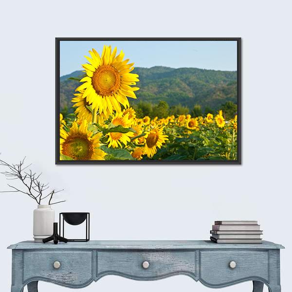 Sunflower Field and Green Mountains Canvas Wall Art in yellow, green and blue, framed canvas, product view on a white background
