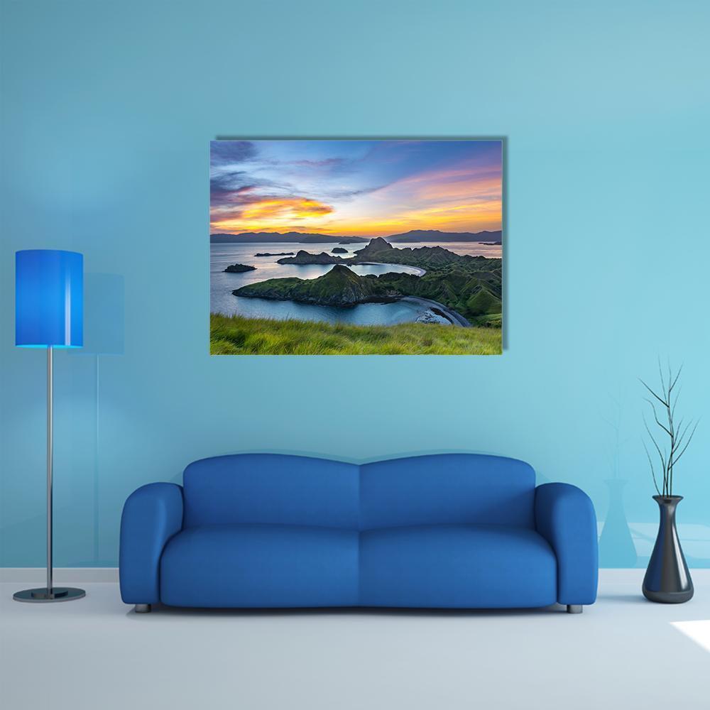 Sunlight Over Island Hills at Sunset Canvas Wall Art in yellow, green and blue, single panel hung on a wall