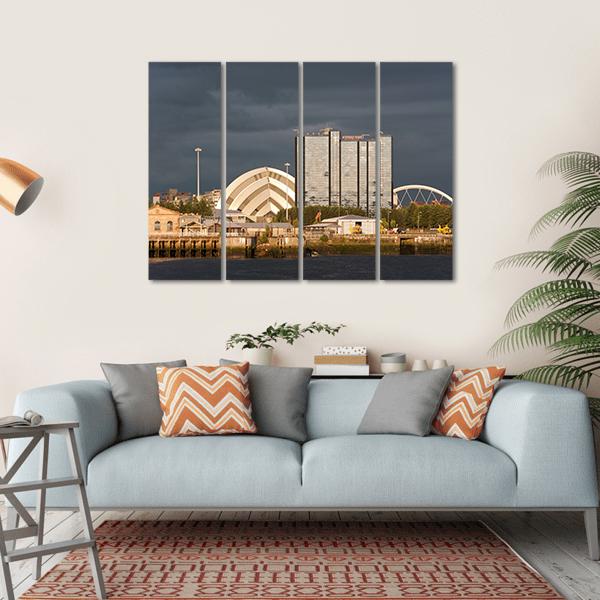 Sunlight On Buildings As Storm Clouds Canvas Wall Art-4 Horizontal-Gallery Wrap-34" x 24"-Tiaracle