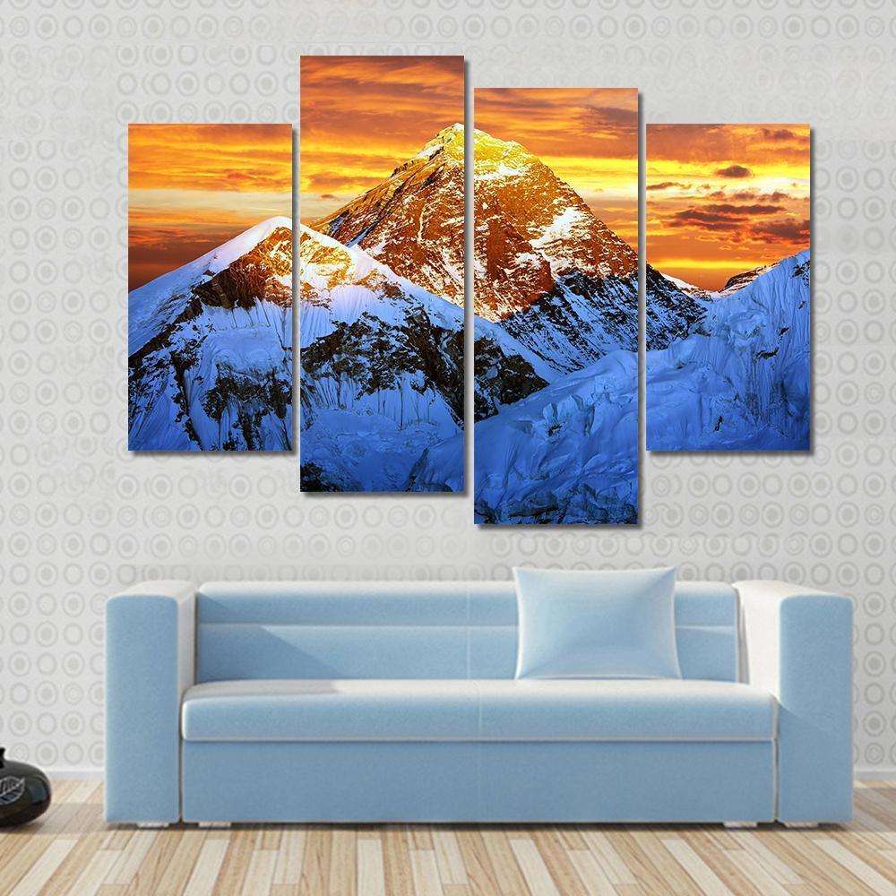 Sunlight on Everest Canvas Wall Art in white, orange and blue, 4 panel Pop layout hung on a wall