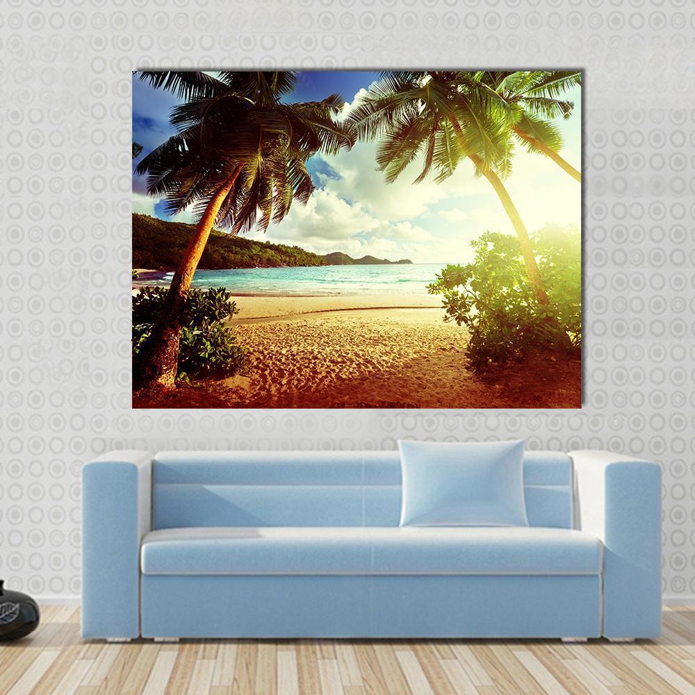 Sunny Day on Green Beach Canvas Wall Art in yellow, green and blue, single panel hung on a wall