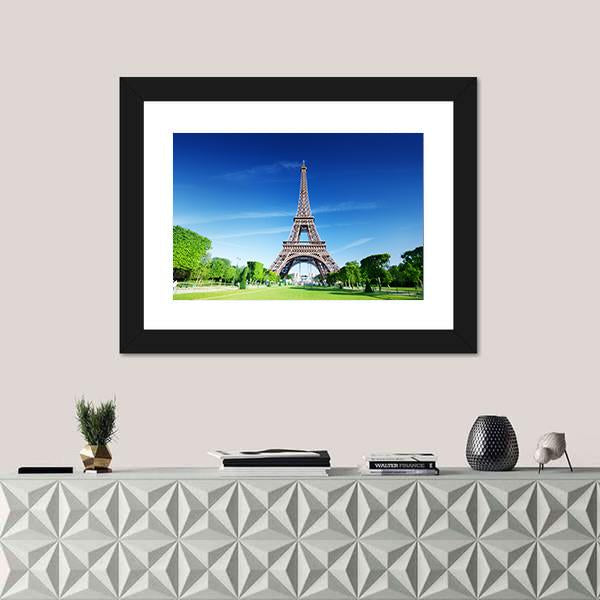 Sunny Morning and Eiffel Tower Canvas Wall Art in brown, green and blue, 5 panel Pop layout hung on a wall