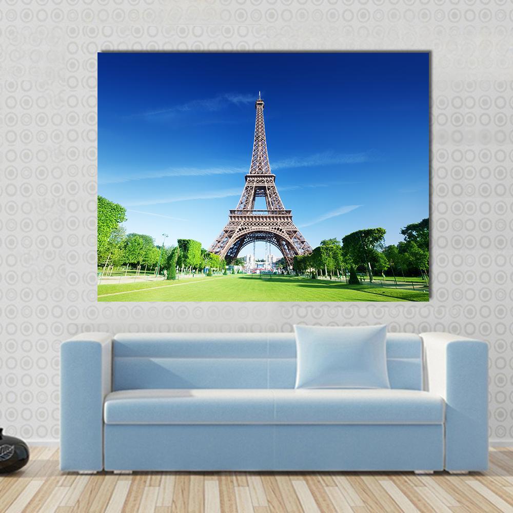 Sunny Morning and Eiffel Tower Canvas Wall Art in brown, green and blue, single panel hung on a wall