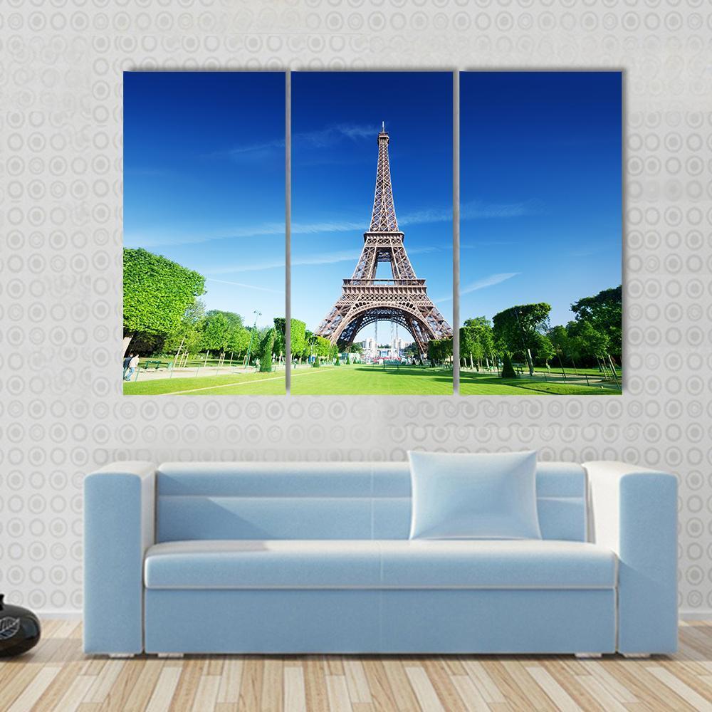 Sunny Morning and Eiffel Tower Canvas Wall Art in brown, green and blue, 5 panel Pop layout hung on a wall