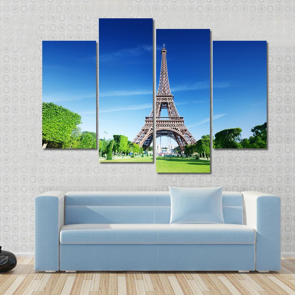 Sunny Morning and Eiffel Tower Canvas Wall Art in brown, green and blue, 5 panel Pop layout hung on a wall