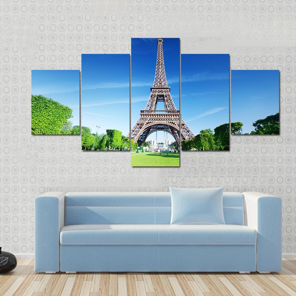 Sunny Morning and Eiffel Tower Canvas Wall Art in brown, green and blue, 5 panel Pop layout hung on a wall
