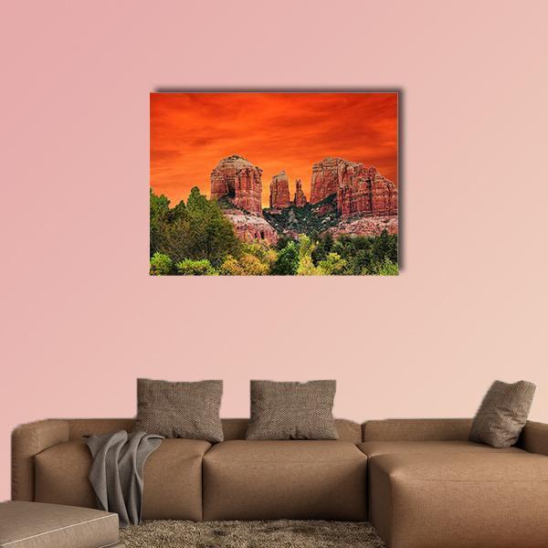 Sunrise Over Cathedral Rock, Sedona Canvas Wall Art in red, orange and green, single panel hung on a wall