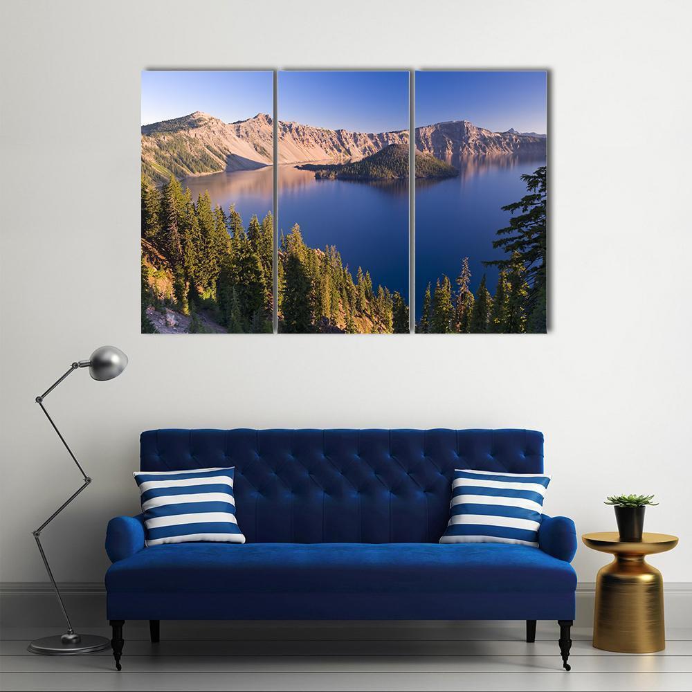 Sunrise Over Crater Lake Canvas Wall Art in brown, green and blue, 3 panel horizontal set hung on a wall