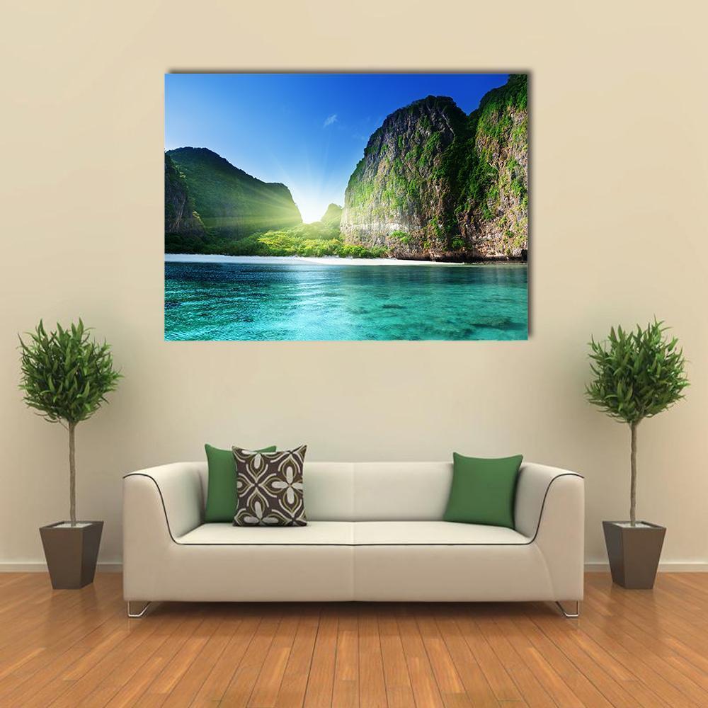 Sunrise Over Maya Bay Canvas Wall Art in green and blue, single panel hung on a wall