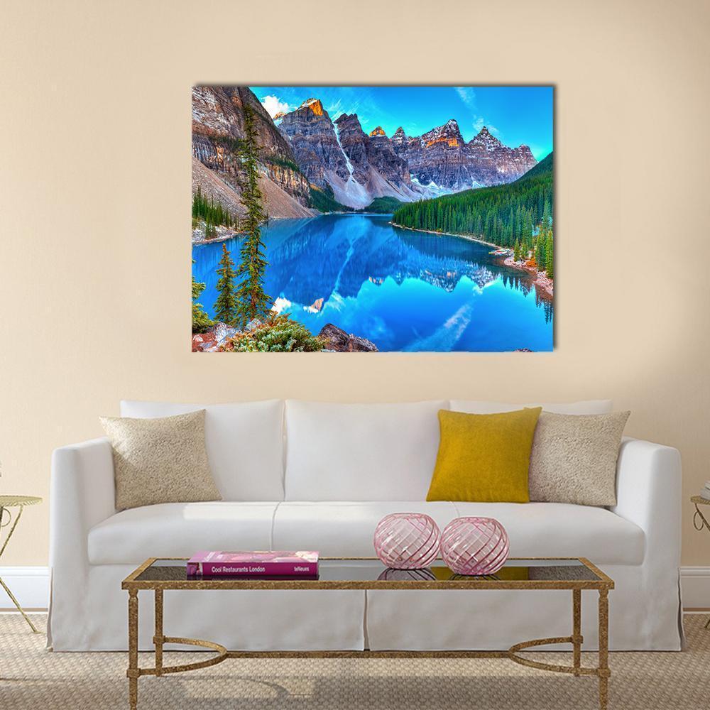 Sunrise Over Moraine Lake Canvas Wall Art in gray, green and blue, single panel hung on a wall