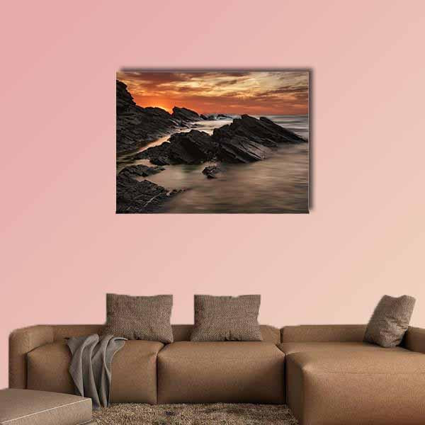 Sinemorets Sunrise Over Rocky Coast Canvas Wall Art in black, brown and orange, single panel hung on a wall